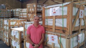 Simon from Graniteworks pictured with the stone that will feature in the Ian Barker Garden Designs garden 'Cross Roads' at the 2015 Melbourne International Flower & Garden Show.