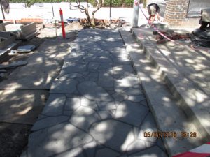 Random bluestone paving path designed and constructed by Melbourne landscape design company Ian Barker Gardens