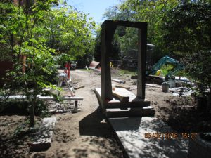 Steel doorway adds a sculptural element to a spectacular garden project in the leafy Melbourne suburb of Camberwell. Garden is designed by Ian Barker Gardens