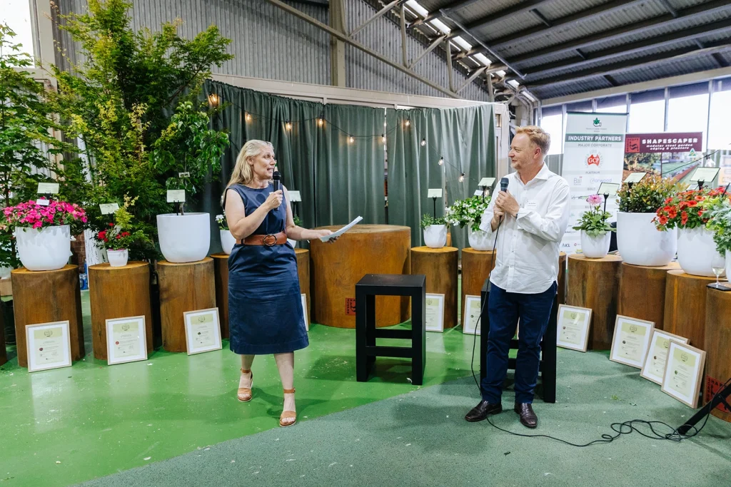 Carolyn Blackman & Ian Barker presenting at the NGIV Summer Soiree. 